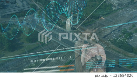 Image of data processing over biracial girl using vr headset and cityscape Image of data processing over biracial girl using vr headset and cityscape 128684826