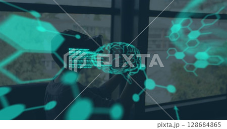 Image of data processing over caucasian boy using vr headset Image of data processing over caucasian boy using vr headset 128684865