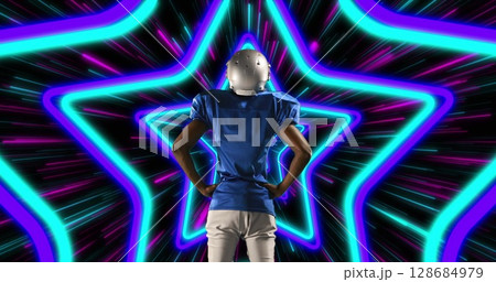 Image of african american male american football player with helmet over shapes Image of african american male american football player with helmet over shapes 128684979