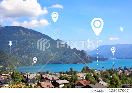 Planning tourist trip in mountains and lake, Austria. Top view of Wolfgangsee lake and location pins. Global positioning system pin map. Travel way, point navigation. Modern travel, sightsee, tourism 128687007