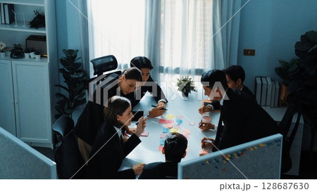 Top view of smart business people brainstorm by using sticky notes. Directorate. 128687630