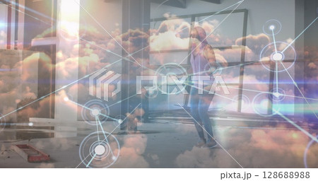 Image of clouds over african american sportswoman exercising Image of clouds over african american sportswoman exercising 128688988