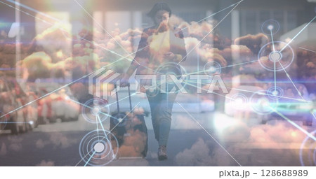 Image of data processing over african american businesswoman walking 128688989