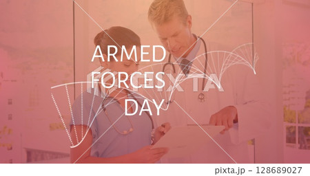 Image of armed forces day over caucasian female and male doctors talking Image of armed forces day over caucasian female and male doctors talking 128689027