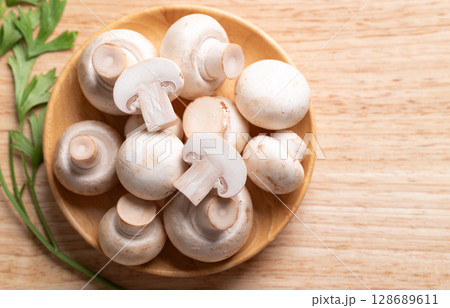 White Button mushroom or Champignon mushroom (Agaricus bisporus), Food ingredient 128689611