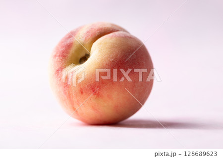 Fresh peach on pink background, Summer fruit 128689623