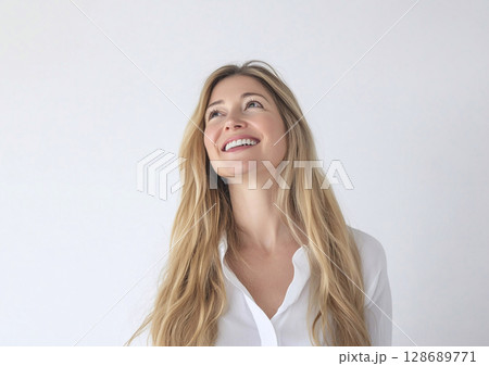 Young happy beautiful woman with long blond hair with cute smile wearing white shirt.AI Generative. 128689771
