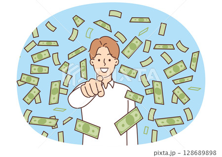 Falling money around smiling man pointing finger at screen inviting business training 128689898