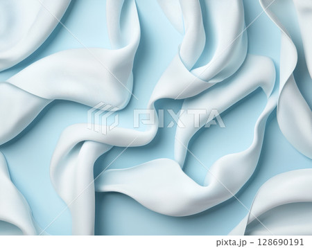 Soft white fabric flowing gently on light blue background creating calm and airy feeling Soft white fabric flowing gently on light blue background creating calm and airy feeling 128690191