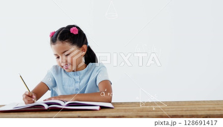 Image of math formulas over happy biracial girl doing homework Image of math formulas over happy biracial girl doing homework 128691417