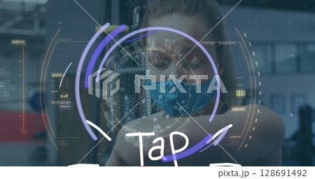 Image of data processing and tap text over caucasian woman wearing face mask 128691492