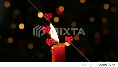 Image of hearts over spots and candle 128691572