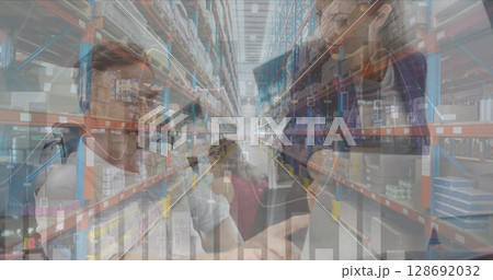 Image of financial data processing over diverse business people in office and warehouse Image of financial data processing over diverse business people in office and warehouse 128692032