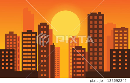 Cityscape in Evening Glow with Buildings Lit Against a Softly Darkening Urban Sky 128692245