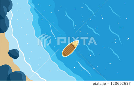 Aerial View of Ocean Waves Meeting Shoreline. With a Lone Boat Floating Near the Water's Edge Aerial View of Ocean Waves Meeting Shoreline. With a Lone Boat Floating Near the Water's Edge 128692657