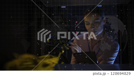 Image of data processing over caucasian female worker in server room Image of data processing over caucasian female worker in server room 128694829
