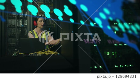 Image of data processing over caucasian female worker in server room 128694831