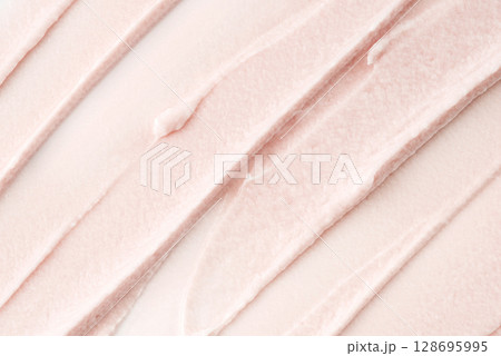 The texture of a pink cream or scrub The texture of a pink cream or scrub 128695995