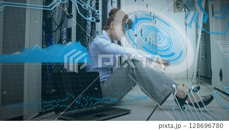 Image of clock and data processing over man using computer 128696780