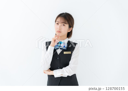 制服の若い女性 ビジネス 悩む 制服の若い女性 ビジネス 悩む 128700155