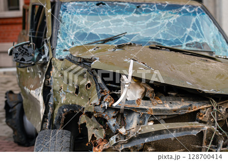 A car donated by Latvia that suffered in the Ukrainian war, close up of the details 128700414