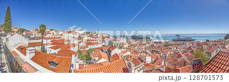 Panoramic view of Alfama with cruise ships in Lisbon 128701573