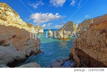 Arch rocks and cliffs at Ponta da Piedade Algarve 128701596