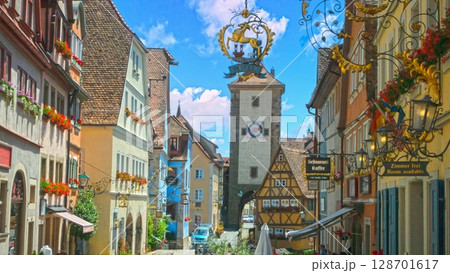 Colorful street with medieval tower in Rothenburg Colorful street with medieval tower in Rothenburg 128701617
