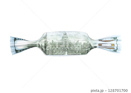 Origami candy made of one hundred dollar banknote on white background Origami candy made of one hundred dollar banknote on white background 128701700