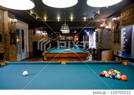 Billiard Table with balls and cue 128703212