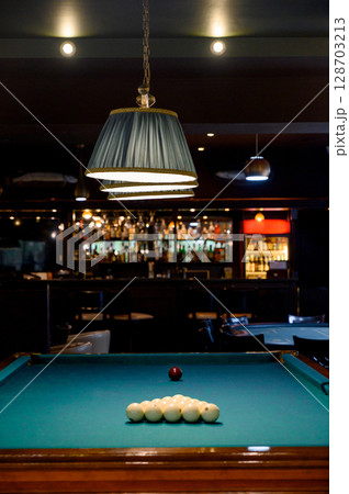 Billiard Table with balls and cue 128703213