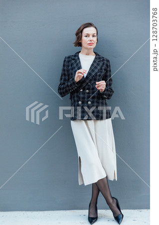 Business Fashion Woman In Skirt And Jacket 128703768