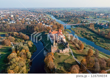 Medieval castle from above, Bauska town aerial panorama with medieval castle Medieval castle from above, Bauska town aerial panorama with medieval castle 128704034
