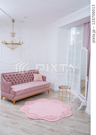 Handmade carpet knitted from natural threads, flooring, natural cotton. Pink handmade carpet. Interior solution for a house or apartment Handmade carpet knitted from natural threads, flooring, natural cotton. Pink handmade carpet. Interior solution for a house or apartment 128706013