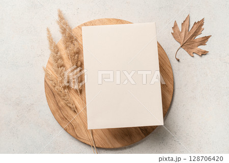 Blank invitation card template with dry plants 128706420