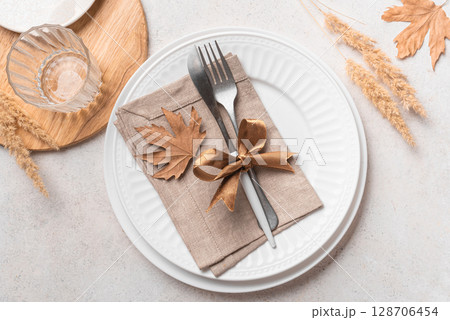 Boho table setting with dry plants 128706454