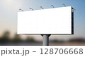 Blank billboard advertising space against a blurred outdoor background. 128706668