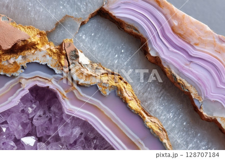 Layered semiprecious quartz geode slice with translucent crystal texture 128707184