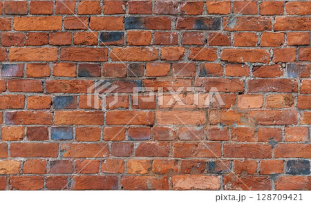 Red Brick Wall with Texture and Rustic Details for Background Uses. Seamless 128709421