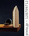 Wooden Shoe Brushes and Polish on Dark Background 128709712