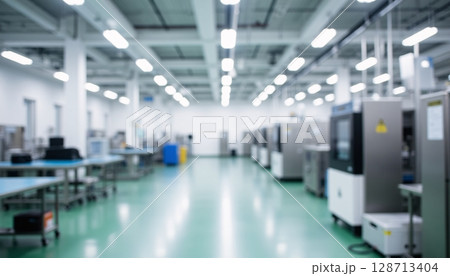 Modern Industrial Factory Interior with Blurred Background and High-Quality Equipment 128713404