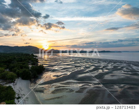 Drone view colorful sunset or sunrise sky over sea. 128713483