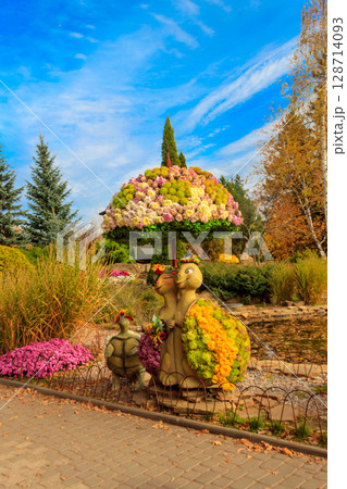 Turtles made of chrysanthemums in a park at autumn Turtles made of chrysanthemums in a park at autumn 128714093