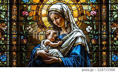 Stunning stained glass window depicts a serene mother holding a baby, surrounded by intricate floral patterns, ideal for religious, spiritual, or art historical themes 128715566