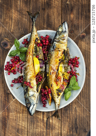 Baked mackerel fish with berries, seafood 128715786