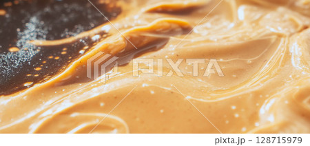 Smooth and creamy peanut butter fudge reveals a rich, nutty treat perfect for candy lovers. Smooth and creamy peanut butter fudge reveals a rich, nutty treat perfect for candy lovers. 128715979