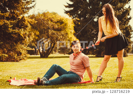 Man held by love on chain. 128716219