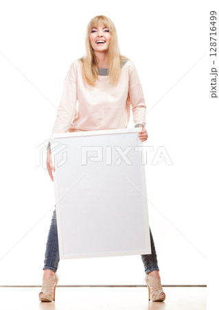 woman holding blank presentation board 128716499