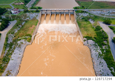 Aerial top view of Pasak Chonlasit Dam, a hydroelectric dam located in Lopburi, Thailand. Aerial top view of Pasak Chonlasit Dam, a hydroelectric dam located in Lopburi, Thailand. 128717294