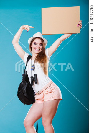 Summer traveler woman hitchhiking with blank sign 128717765